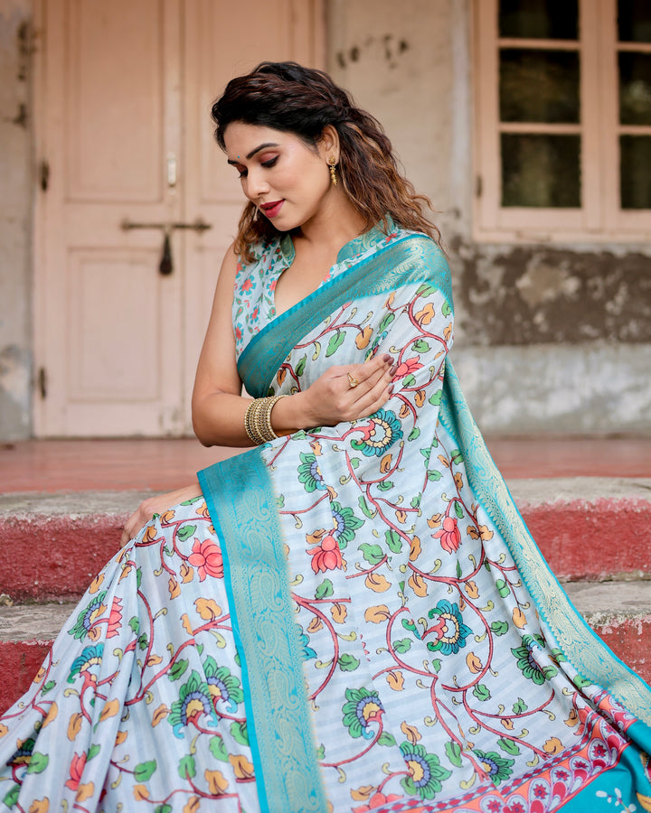 Ice Blue Tussar Silk Saree with Kalamkari Floral Print, Turquoise Woven Border, Peacock Pallu, Tassels & Attached Blouse