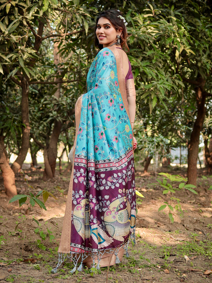 Aqua Blue Tussar Silk Saree with Floral Print, Peacock Pallu, Antique Gold Woven Border, Tassels & Attached Blouse