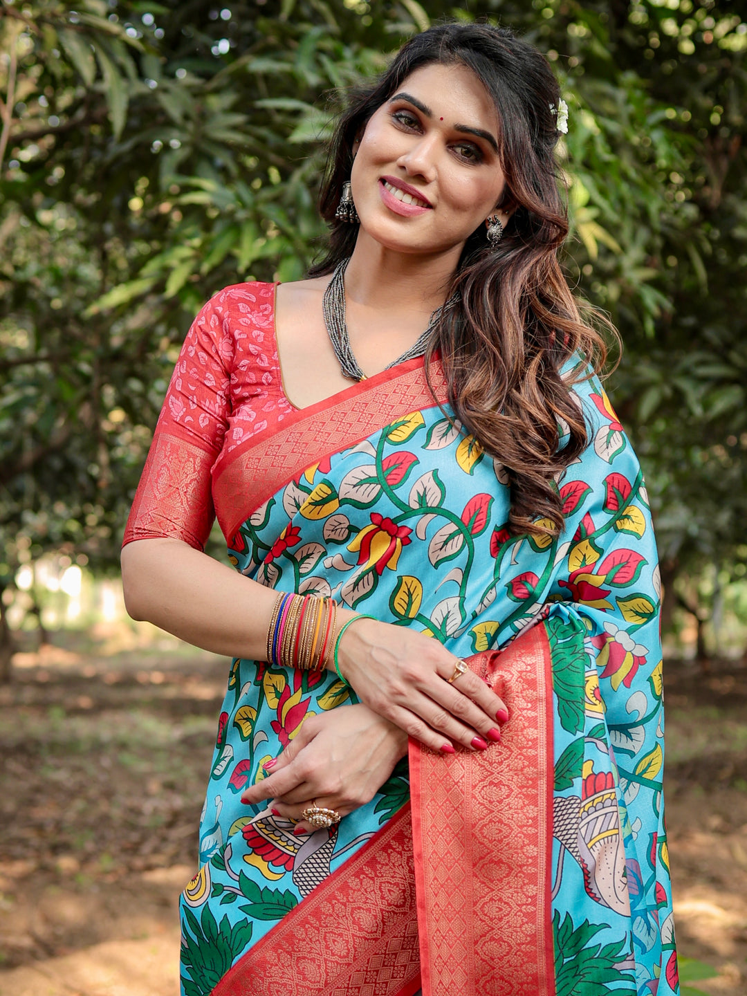 Sky Blue Tussar Silk Saree with Madhubani Folk Art Print, Coral Woven Border, Tassels & Attached Blouse