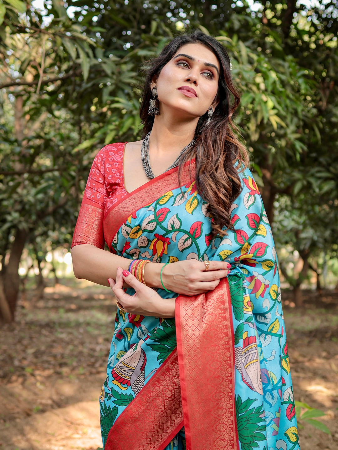 Sky Blue Tussar Silk Saree with Madhubani Folk Art Print, Coral Woven Border, Tassels & Attached Blouse