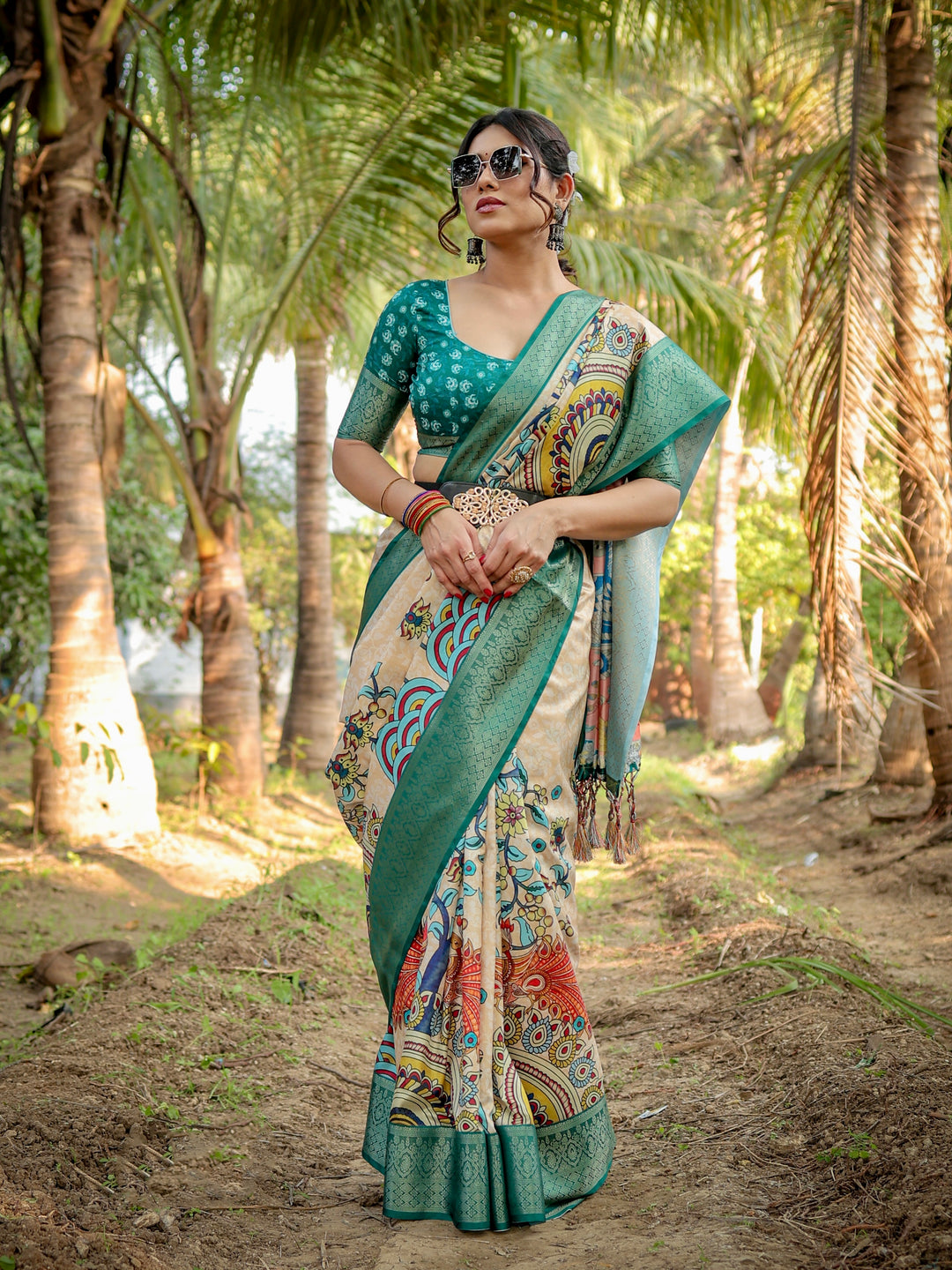 Ivory Tussar Silk Saree with Kalamkari Peacock Print, Teal Green Woven Border, Tassels & Attached Blouse