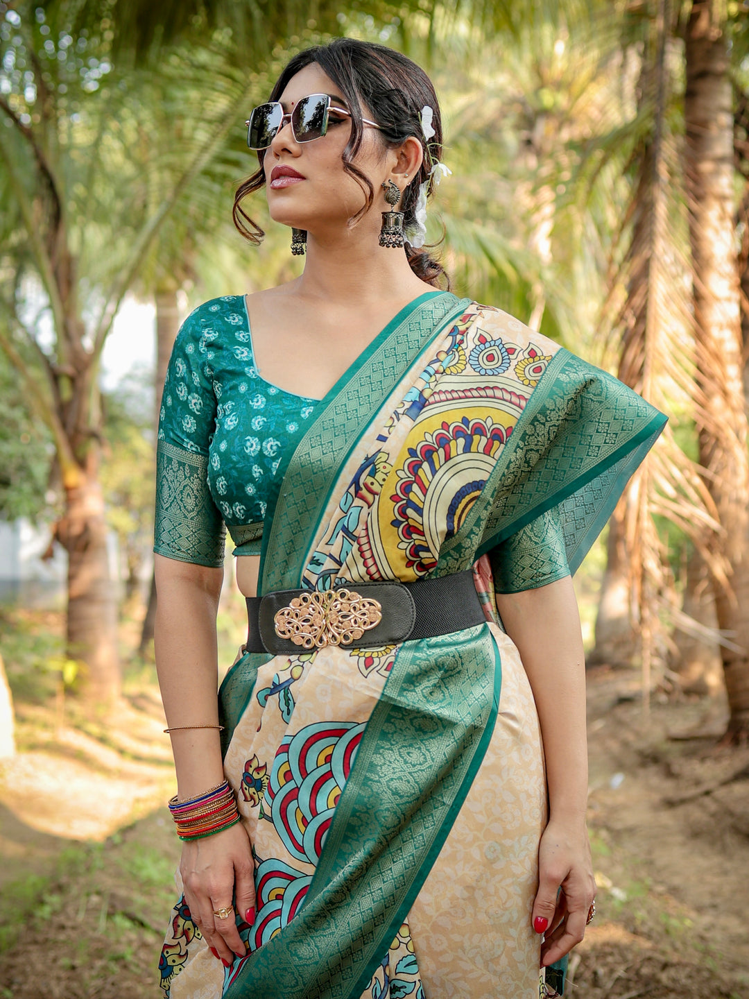 Ivory Tussar Silk Saree with Kalamkari Peacock Print, Teal Green Woven Border, Tassels & Attached Blouse