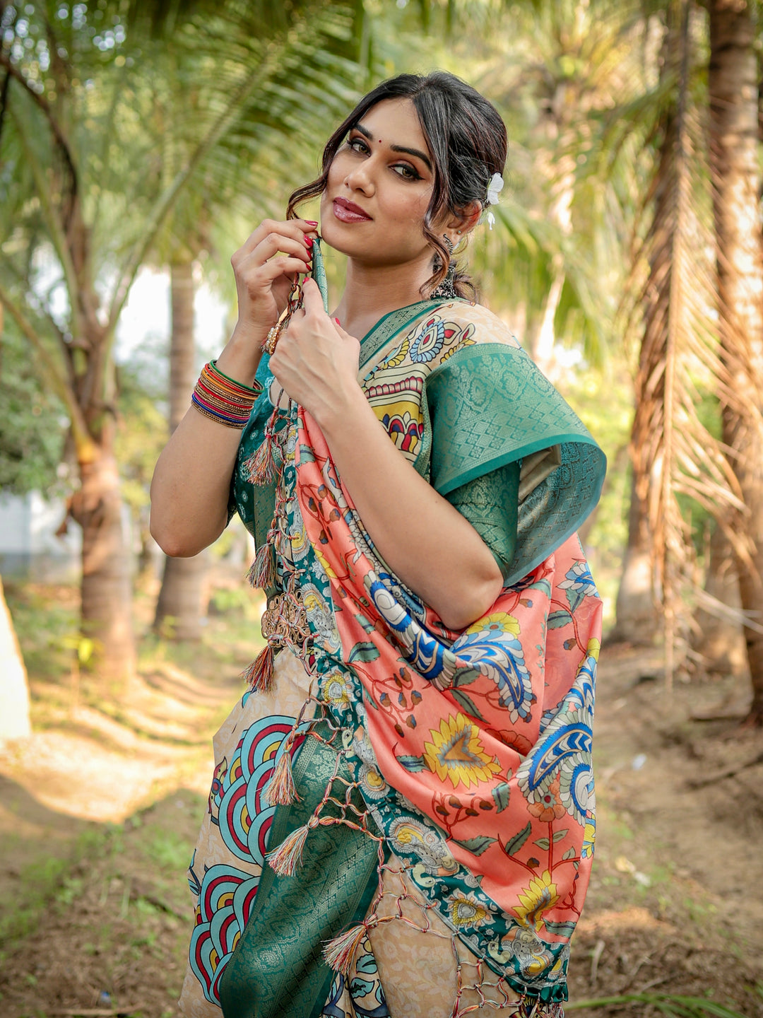 Ivory Tussar Silk Saree with Kalamkari Peacock Print, Teal Green Woven Border, Tassels & Attached Blouse