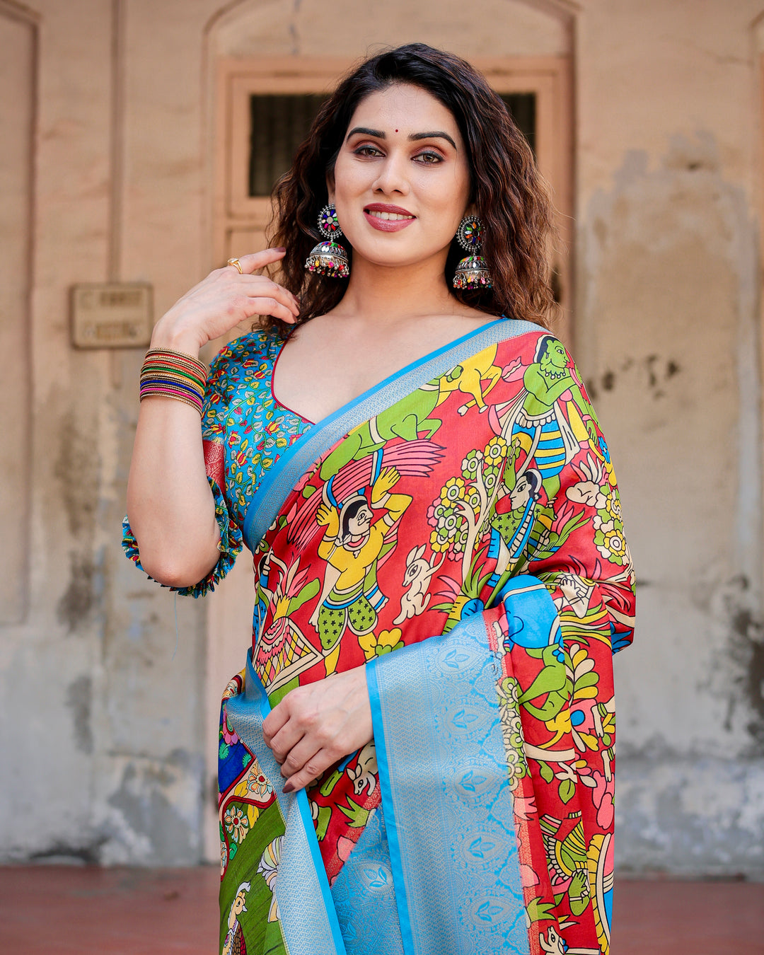 Red Multicolour Tussar Silk Saree with Traditional Folk Art Print, Sky Blue Woven Border, Tassels & Attached Blouse
