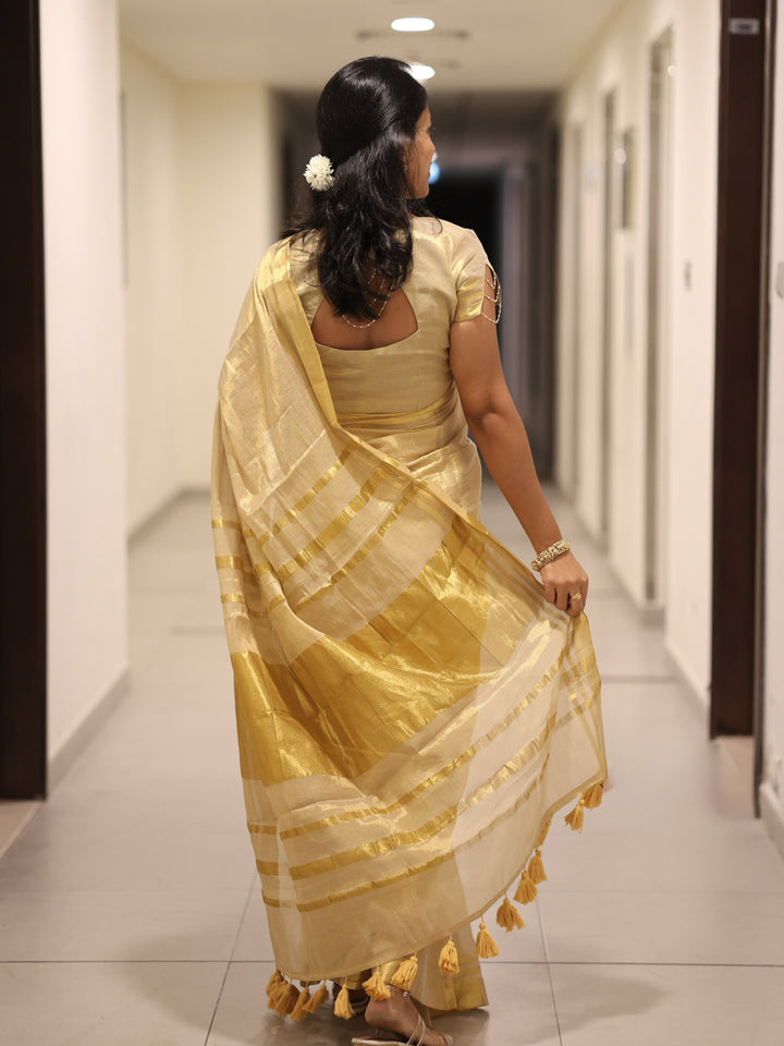 Royal Gold Kasavu Saree with Shimmer Zari Weave, Statement Pallu & Tassels on Edges, Comes With Attached Blouse Piece