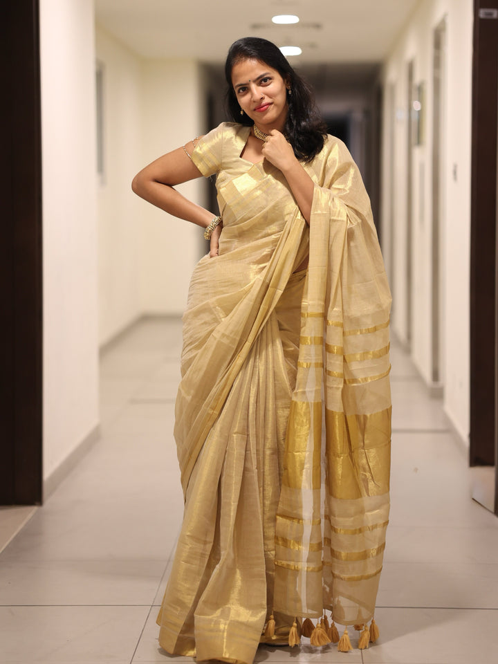 Royal Gold Kasavu Saree with Shimmer Zari Weave, Statement Pallu & Tassels on Edges, Comes With Attached Blouse Piece