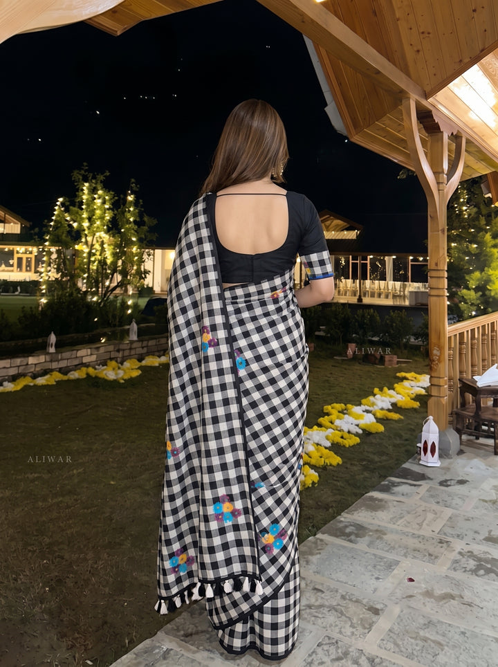 Black & White Checkered Mul Cotton Saree with Multicolour Floral Motifs, Tassels & Blouse Piece
