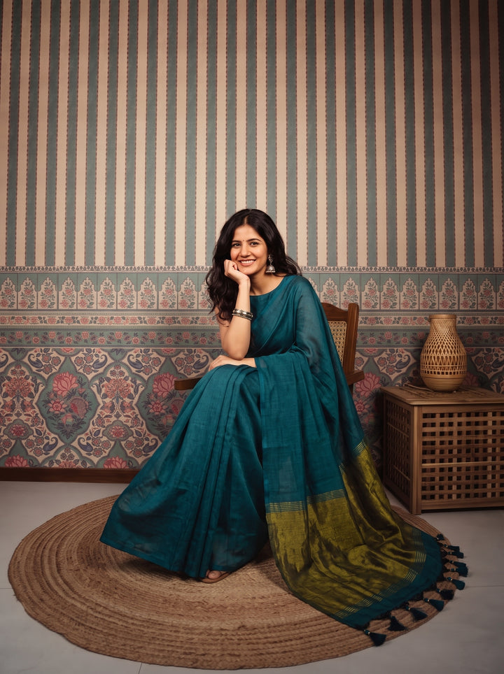 Teal Blue Mul Cotton Saree with Antique Gold Zari Woven Pallu, Tassels & Matching Blouse