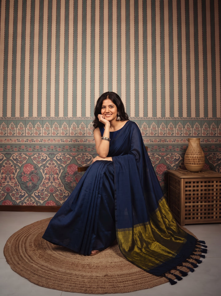 Navy Blue Mul Cotton Saree with Antique Gold Zari Woven Pallu, Tassels & Matching Blouse