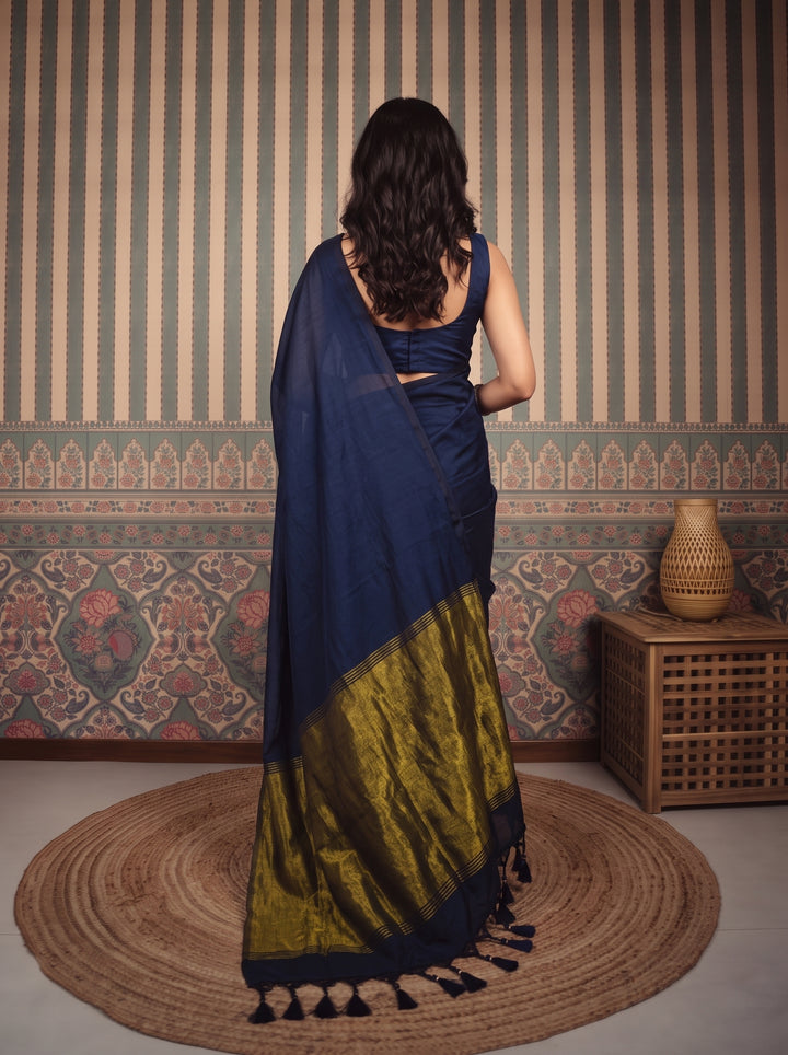Navy Blue Mul Cotton Saree with Antique Gold Zari Woven Pallu, Tassels & Matching Blouse