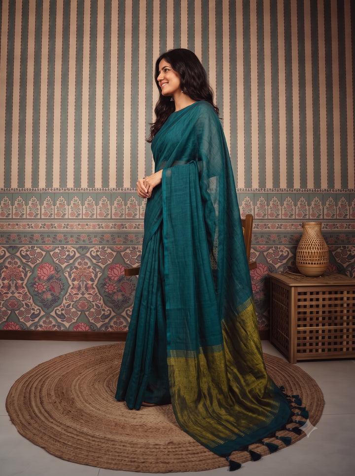 Teal Blue Mul Cotton Saree with Antique Gold Zari Woven Pallu, Tassels & Matching Blouse