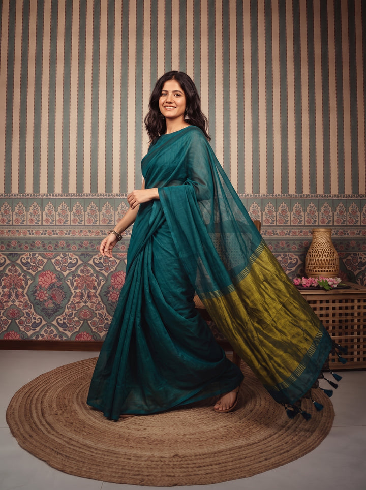 Teal Blue Mul Cotton Saree with Antique Gold Zari Woven Pallu, Tassels & Matching Blouse