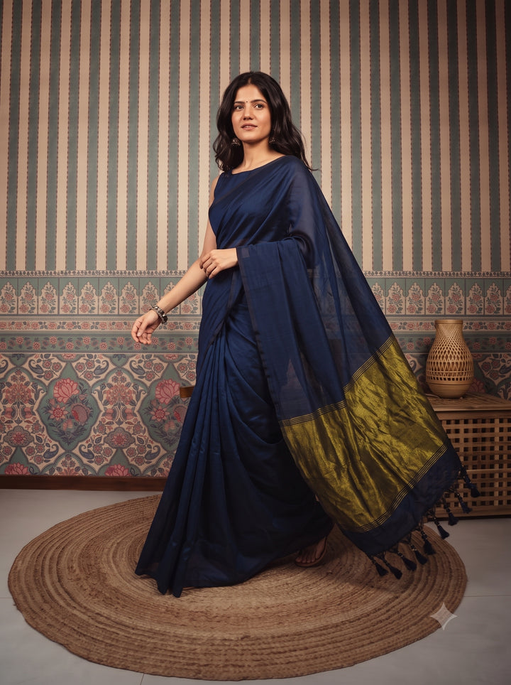 Navy Blue Mul Cotton Saree with Antique Gold Zari Woven Pallu, Tassels & Matching Blouse