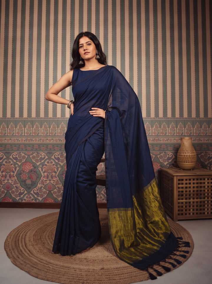 Navy Blue Mul Cotton Saree with Antique Gold Zari Woven Pallu, Tassels & Matching Blouse