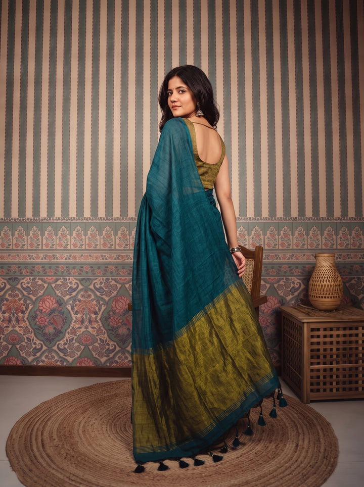 Teal Blue Mul Cotton Saree with Antique Gold Zari Woven Pallu, Tassels & Matching Blouse