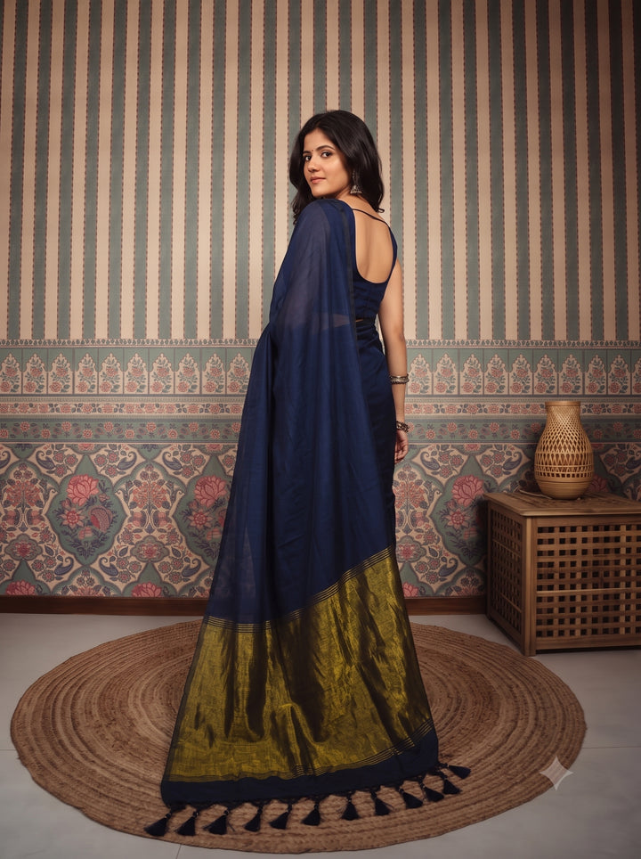 Navy Blue Mul Cotton Saree with Antique Gold Zari Woven Pallu, Tassels & Matching Blouse