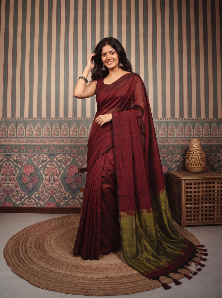 Maroon Mul Cotton Saree with Antique Gold Zari Woven Pallu, Tassels & Matching Blouse