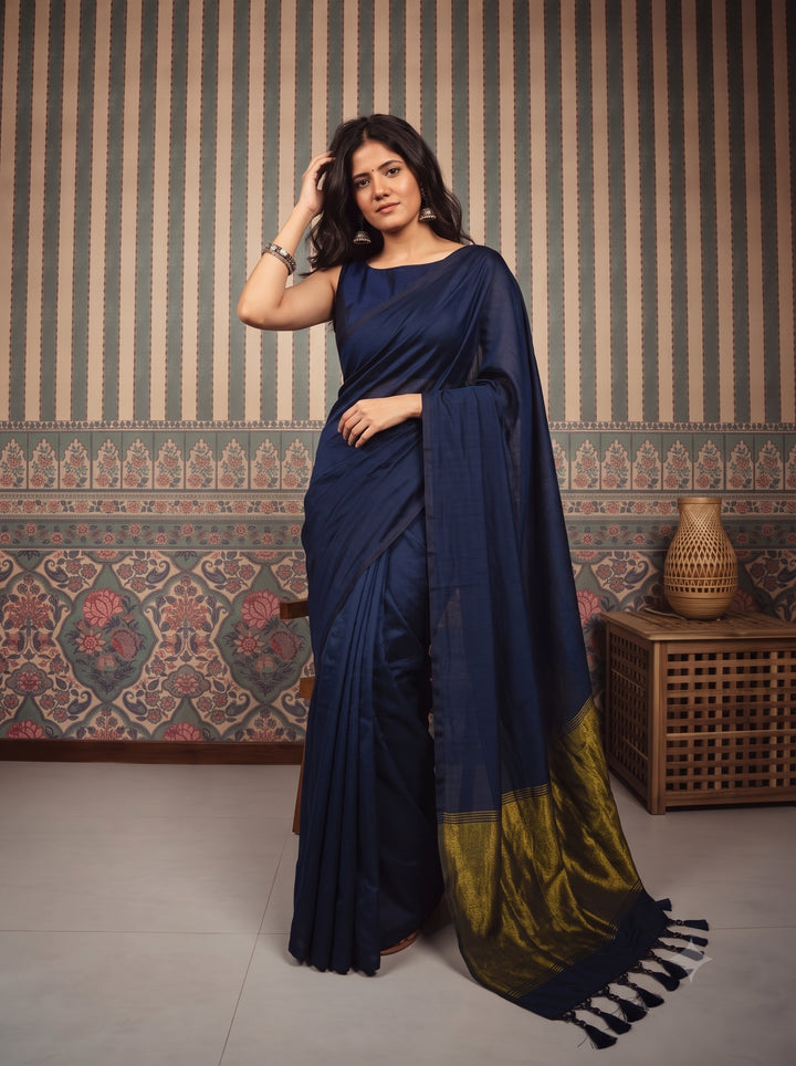 Navy Blue Mul Cotton Saree with Antique Gold Zari Woven Pallu, Tassels & Matching Blouse