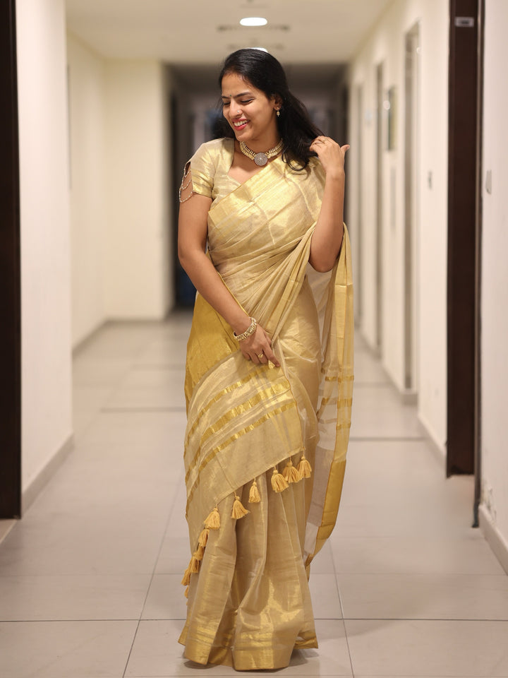 Royal Gold Kasavu Saree with Shimmer Zari Weave, Statement Pallu & Tassels on Edges, Comes With Attached Blouse Piece
