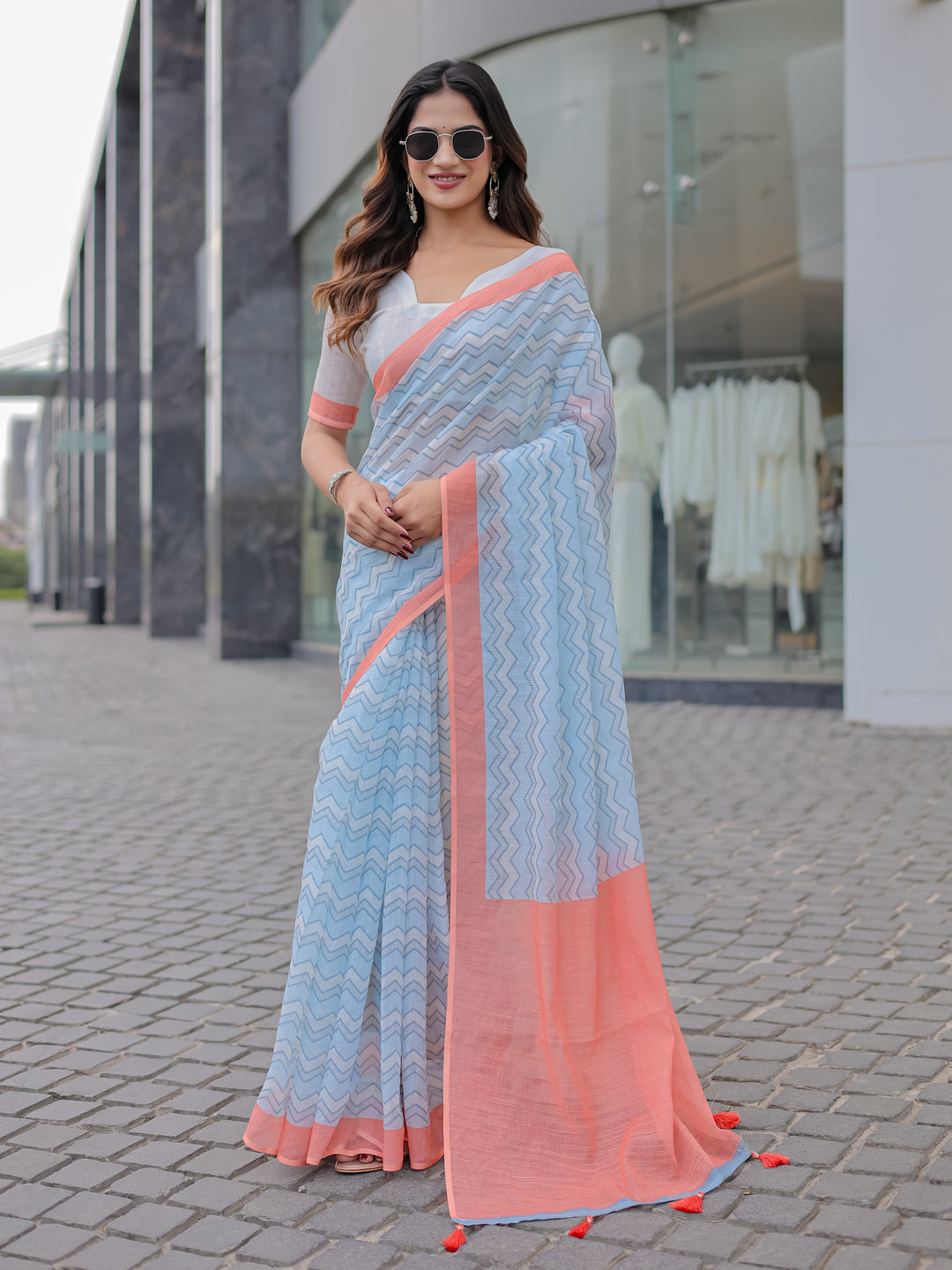 Powder Blue Mul Cotton Chevron Print Saree with Coral Border, Statement Pallu & Tassels | Office Wear Saree