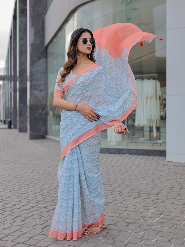 Powder Blue Mul Cotton Chevron Print Saree with Coral Border, Statement Pallu & Tassels | Office Wear Saree