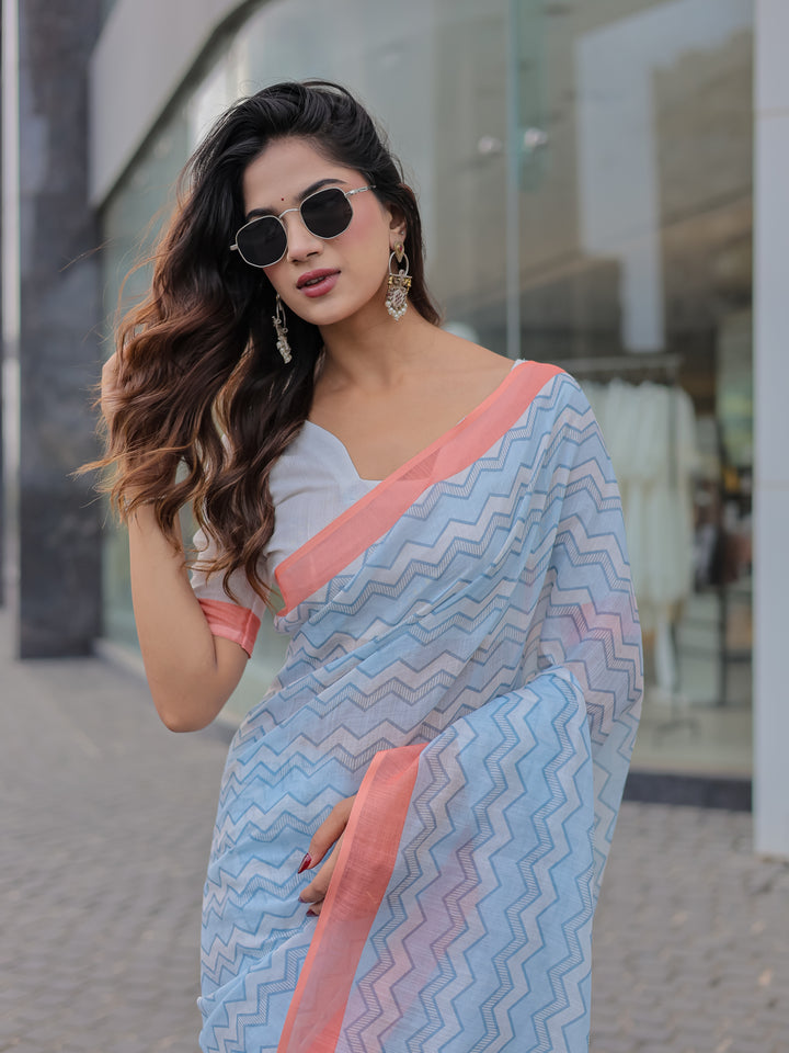 Powder Blue Mul Cotton Chevron Print Saree with Coral Border, Statement Pallu & Tassels | Office Wear Saree