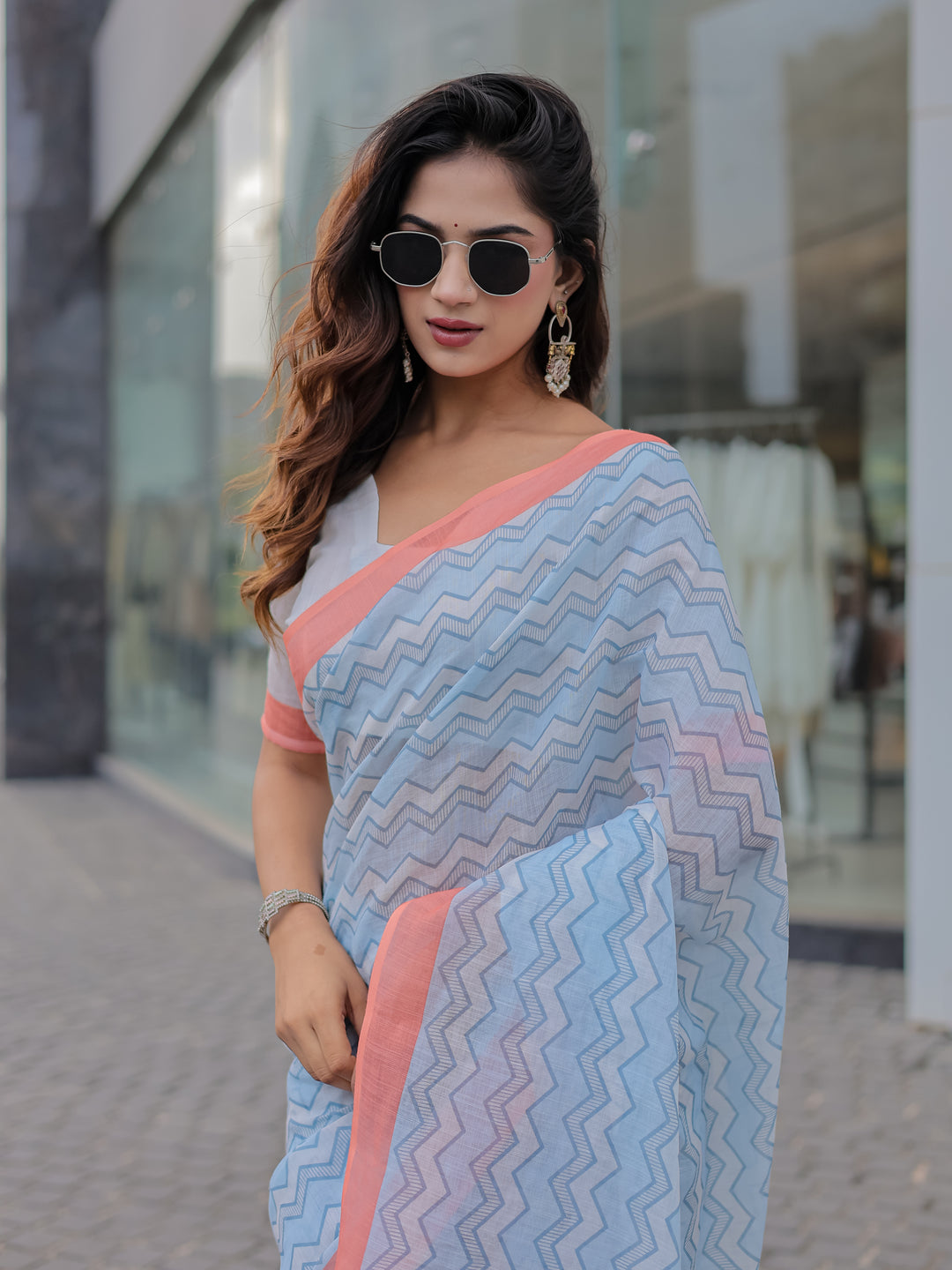 Powder Blue Mul Cotton Chevron Print Saree with Coral Border, Statement Pallu & Tassels | Office Wear Saree