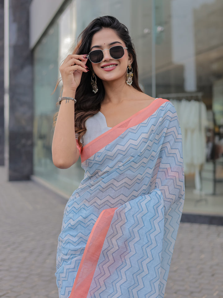 Powder Blue Mul Cotton Chevron Print Saree with Coral Border, Statement Pallu & Tassels | Office Wear Saree