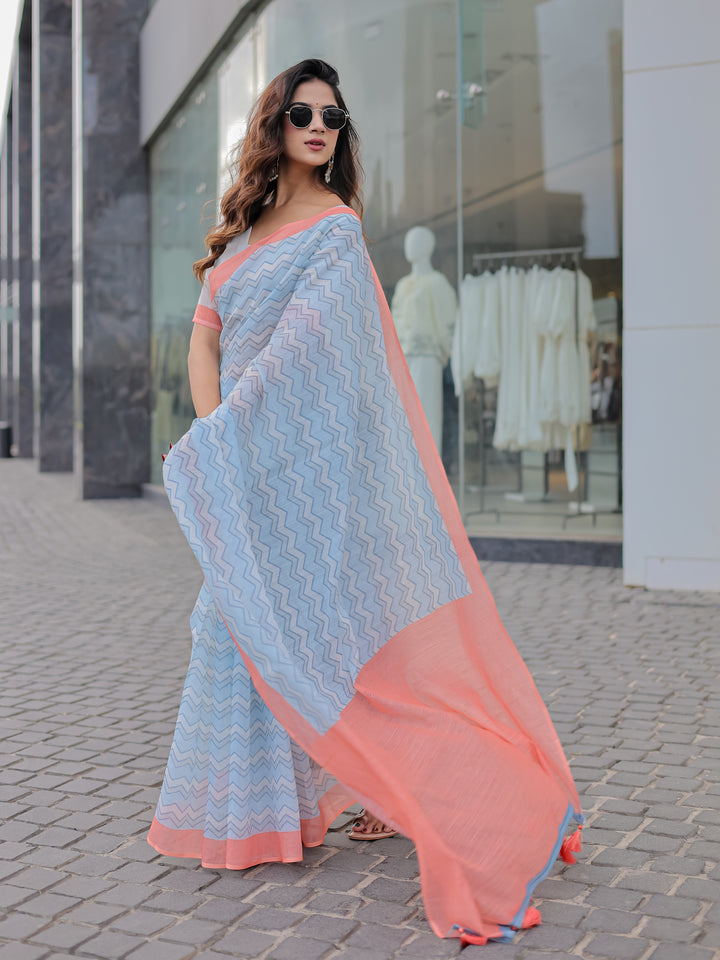 Powder Blue Mul Cotton Chevron Print Saree with Coral Border, Statement Pallu & Tassels | Office Wear Saree
