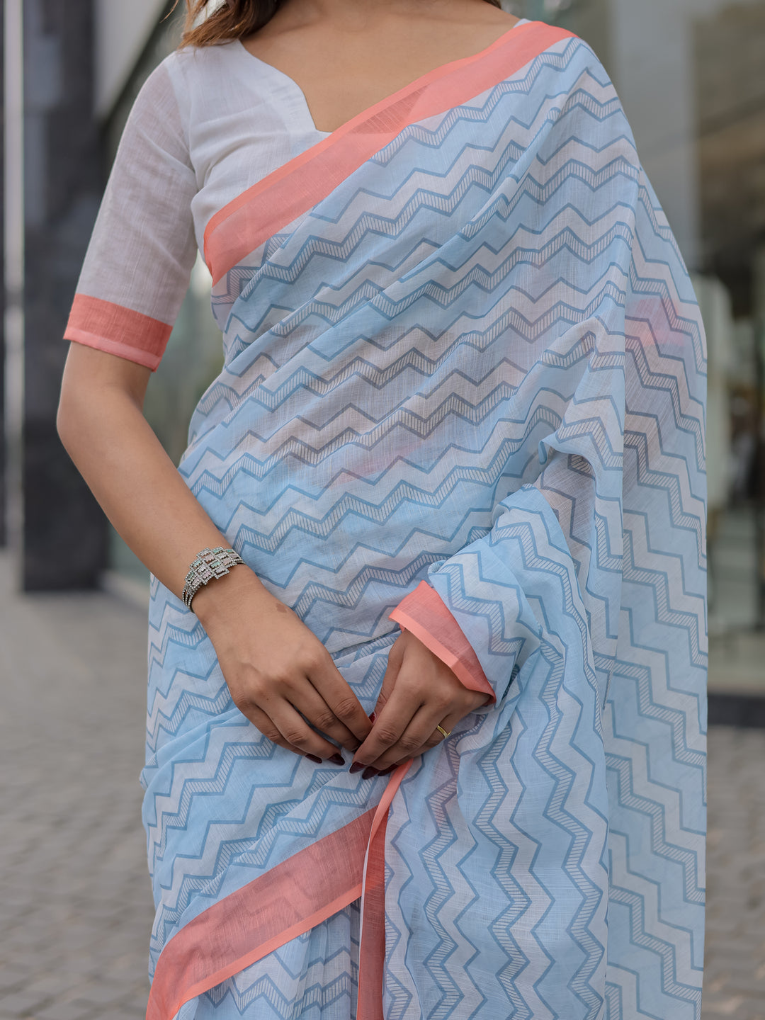 Powder Blue Mul Cotton Chevron Print Saree with Coral Border, Statement Pallu & Tassels | Office Wear Saree