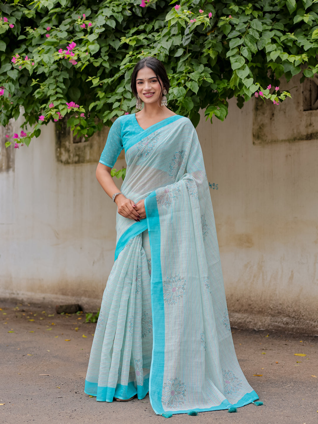 Aqua Blue Mul Cotton Floral Print Saree with Contrast Border & Tassels | Elegant Office & Daily Wear Saree