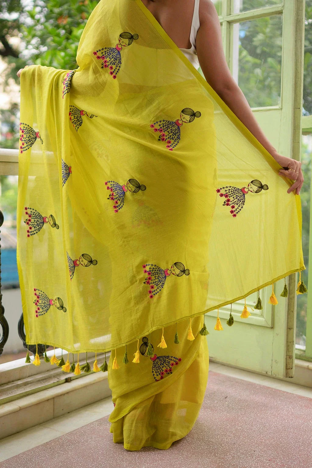 Lime Green Mul Cotton Saree with Embroidered Doll Motifs & Floral Detailing