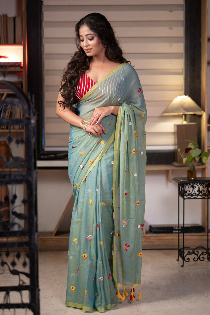 Sage Green Mul Cotton Saree with Multicolour Floral Motifs, Contrast Border & Tassel Pallu