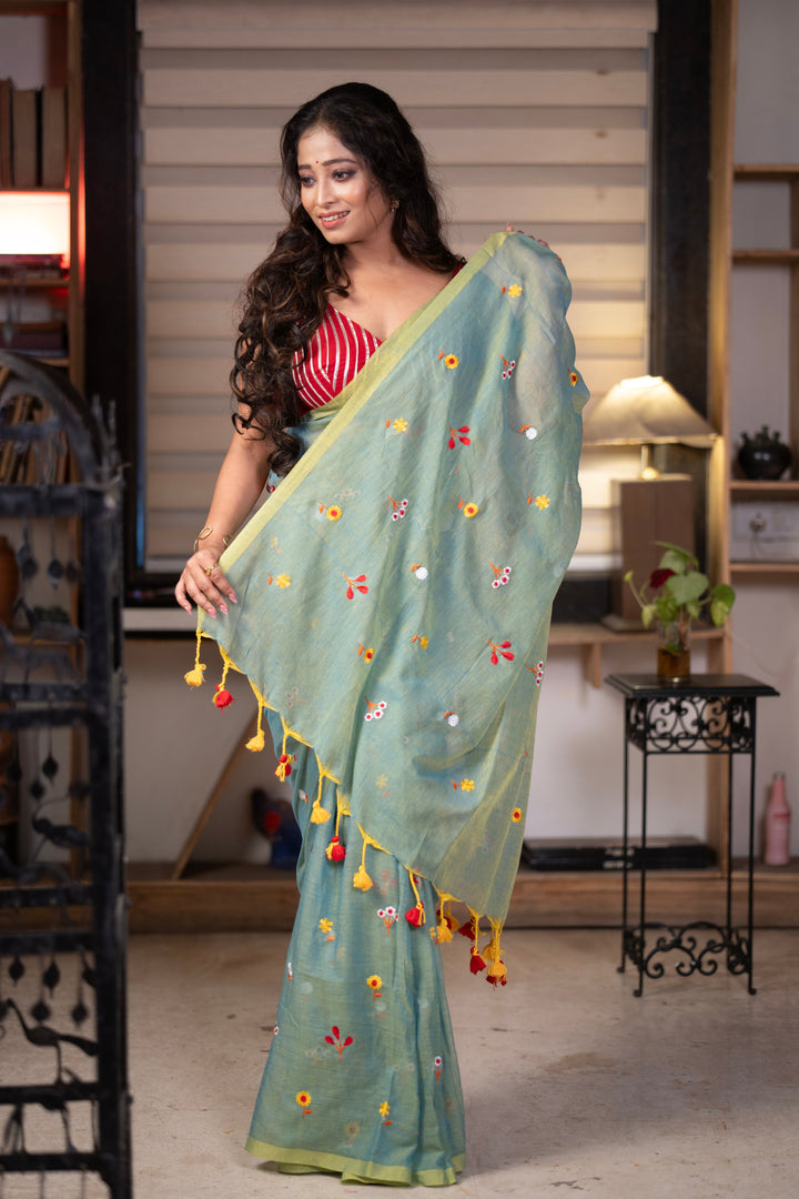 Sage Green Mul Cotton Saree with Multicolour Floral Motifs, Contrast Border & Tassel Pallu