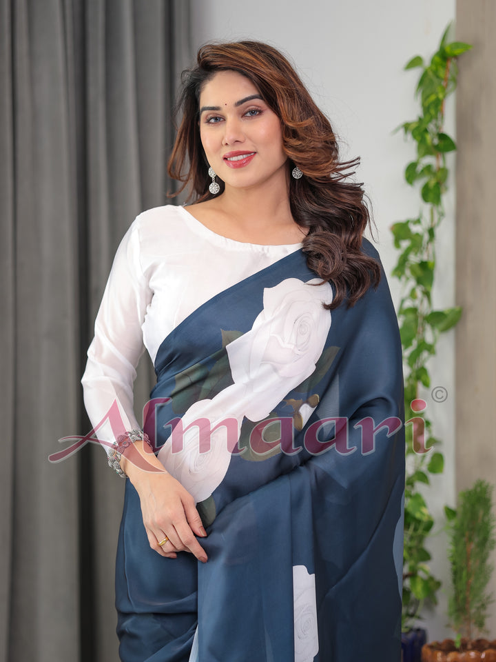 Midnight Blue Satin Georgette White Rose Printed Saree with Attached Blouse – Elegant Designer Saree for Festive & Evening Wear