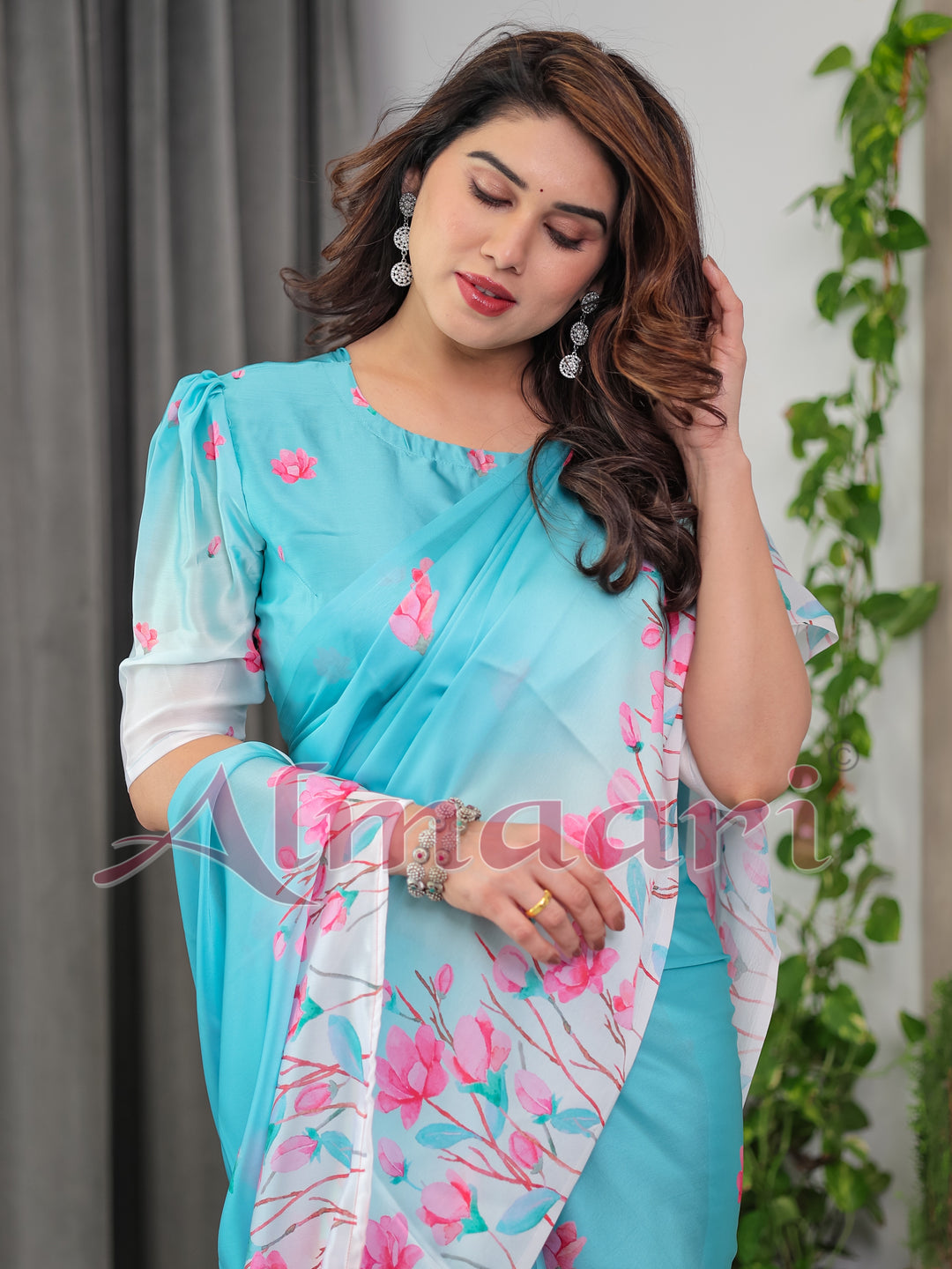 Aqua Blue Satin Georgette Pink Floral Printed Saree with Attached Blouse – Soft Pastel Designer Saree for Elegant & Festive Wear