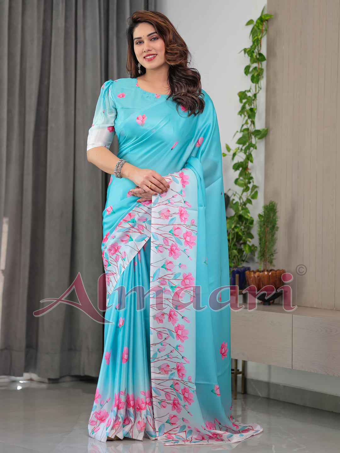 Aqua Blue Satin Georgette Pink Floral Printed Saree with Attached Blouse – Soft Pastel Designer Saree for Elegant & Festive Wear