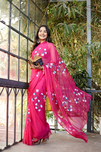 Rani Pink Georgette Saree with Hand-Painted Blue & White Bell Flowers – Attached Blouse – 5.5 Meters