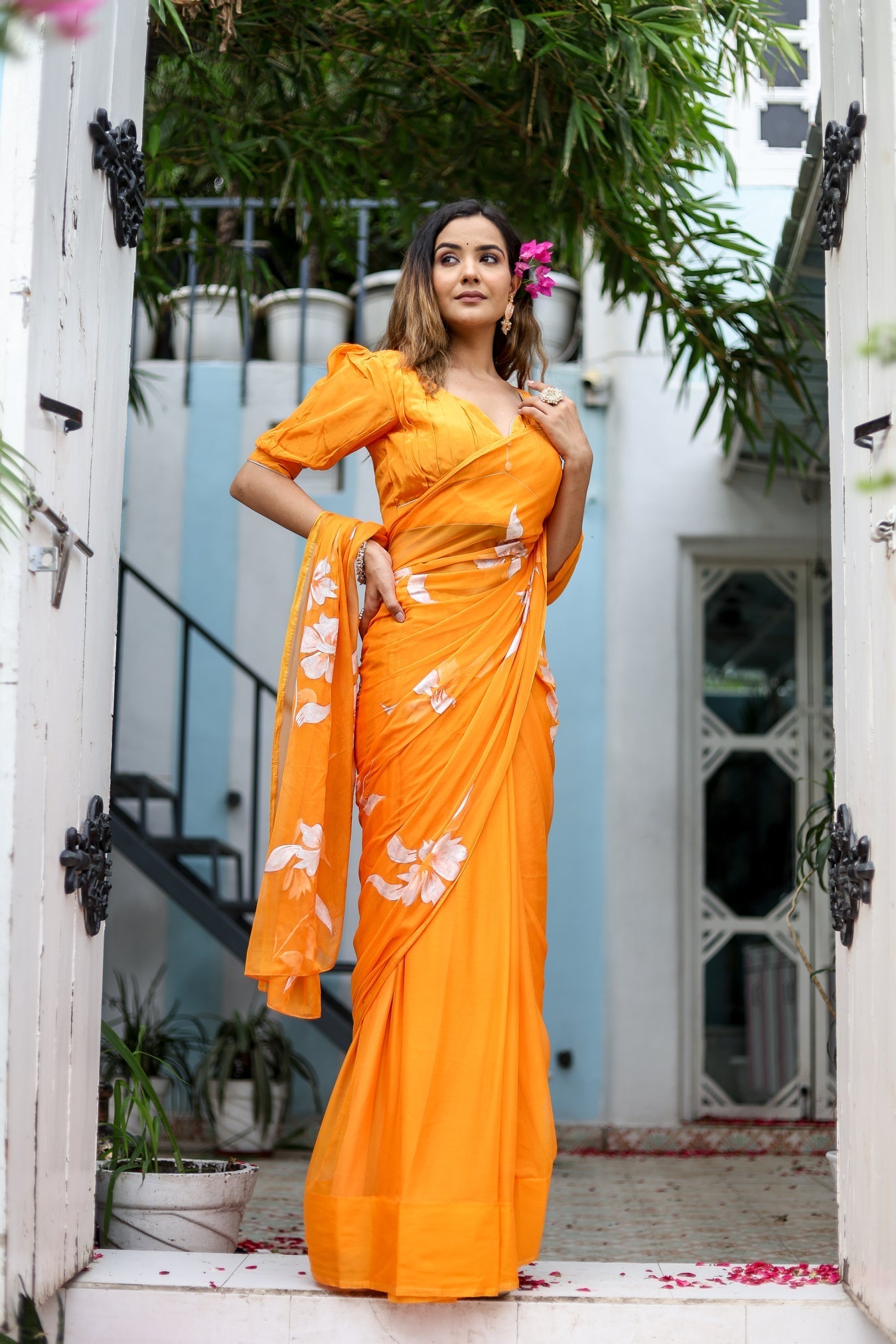 Sunset Orange Georgette Saree with Hand-Painted White Floral Motifs – Attached Blouse – 5.5 Meters