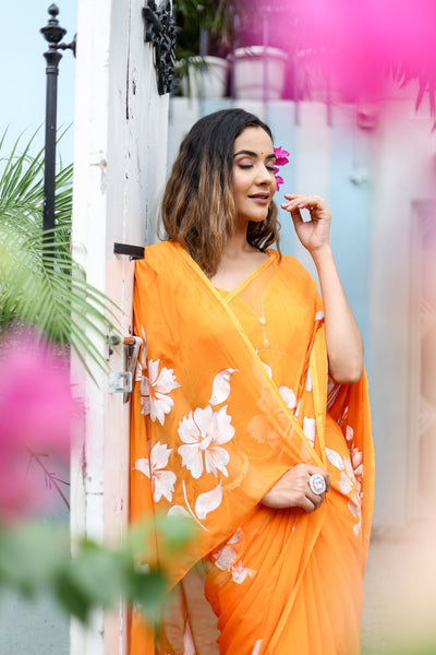Sunset Orange Georgette Saree with Hand-Painted White Floral Motifs – Attached Blouse – 5.5 Meters