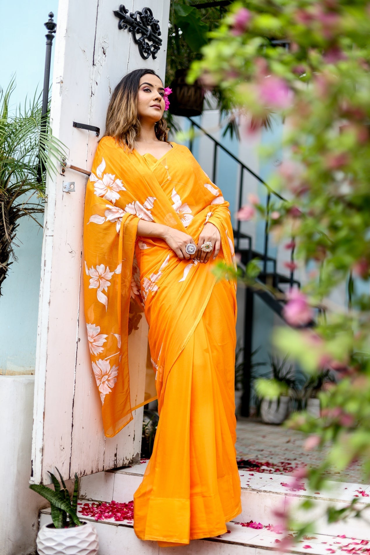 Sunset Orange Georgette Saree with Hand-Painted White Floral Motifs – Attached Blouse – 5.5 Meters