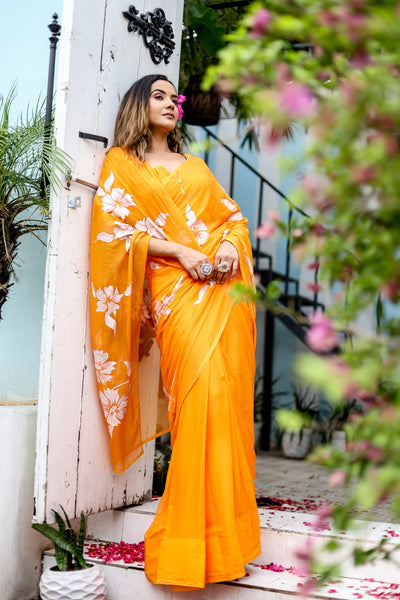 Sunset Orange Georgette Saree with Hand-Painted White Floral Motifs – Attached Blouse – 5.5 Meters