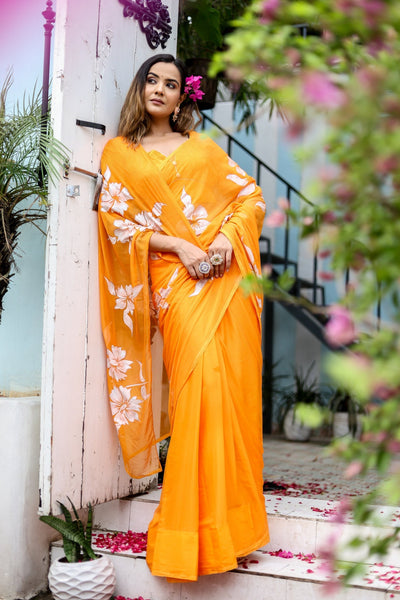 Sunset Orange Georgette Saree with Hand-Painted White Floral Motifs – Attached Blouse – 5.5 Meters