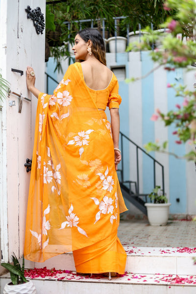 Sunset Orange Georgette Saree with Hand-Painted White Floral Motifs – Attached Blouse – 5.5 Meters