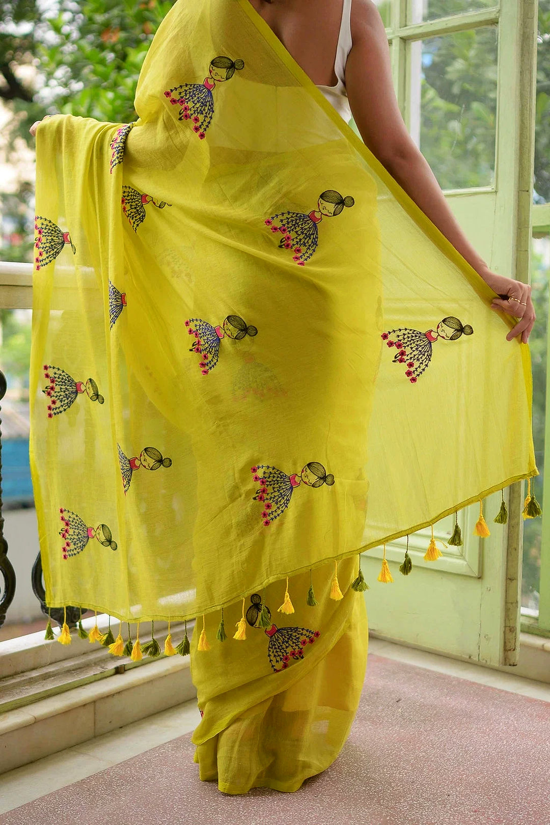 Lime Green Mul Cotton Saree with Embroidered Doll Motifs & Floral Detailing