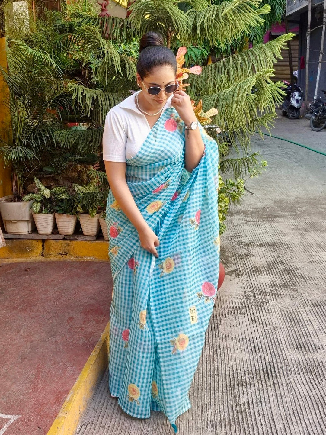 Aqua Blue Checkered Mul Cotton Saree with Floral Print & Tassels
