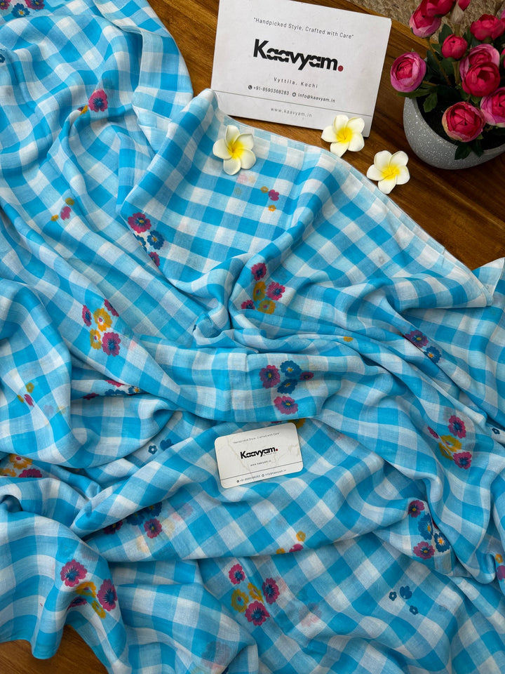 Sky Blue & White Checkered Mul Cotton Saree with Multicolour Floral Motifs, Tassels & Blouse Piece