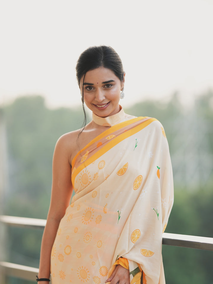 Tanya Mittal Inspired Viral Chinnon Saree in Ivory Cream with Citrus & Sunflower Prints and Contrast Yellow Border