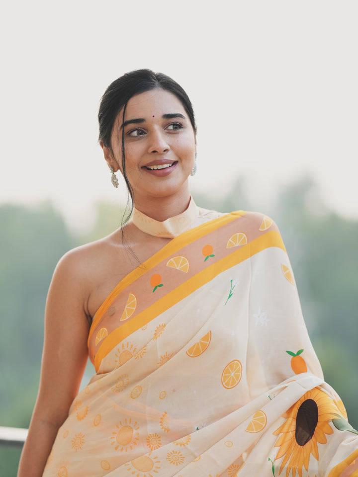 Tanya Mittal Inspired Viral Chinnon Saree in Ivory Cream with Citrus & Sunflower Prints and Contrast Yellow Border