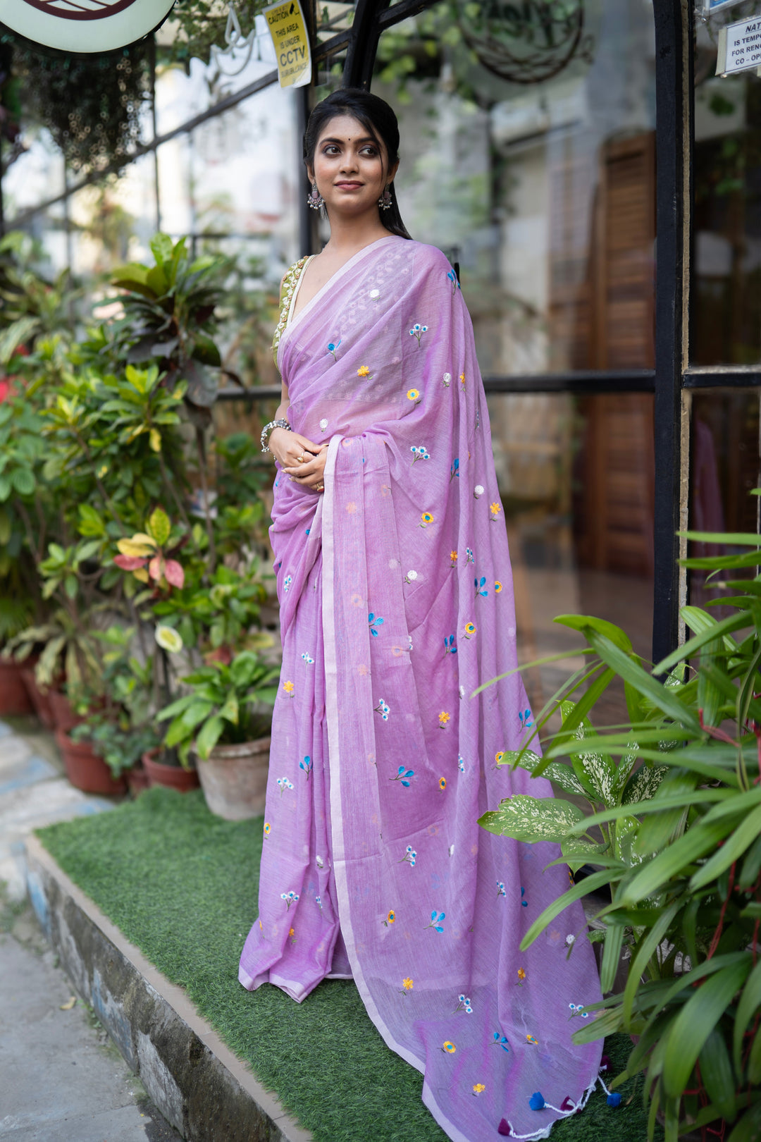 Lavender Purple Mul Cotton Saree with Multicolour Floral Motifs & Contrast Tassel Pallu